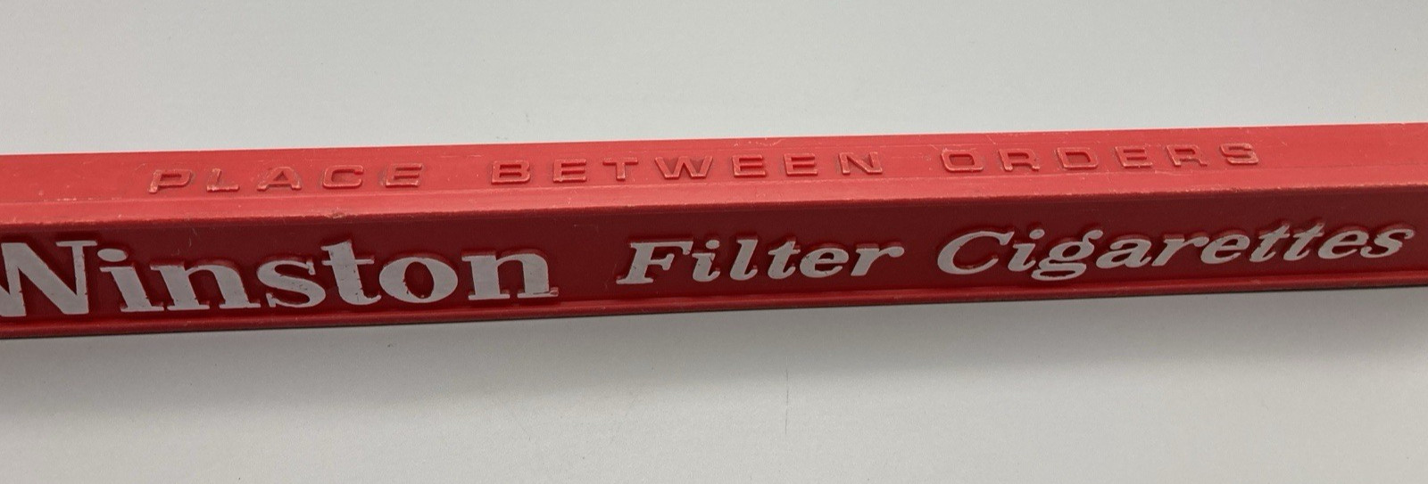 Vintage grocery store belt order divider cigarette advertising Winston 1970’s