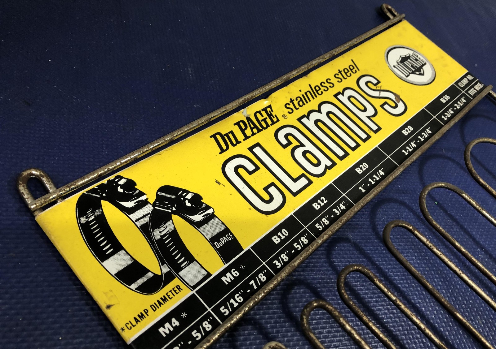 Du Page Stainless Steel Hose Clamps Counter Display Rack vintage sign gas oil