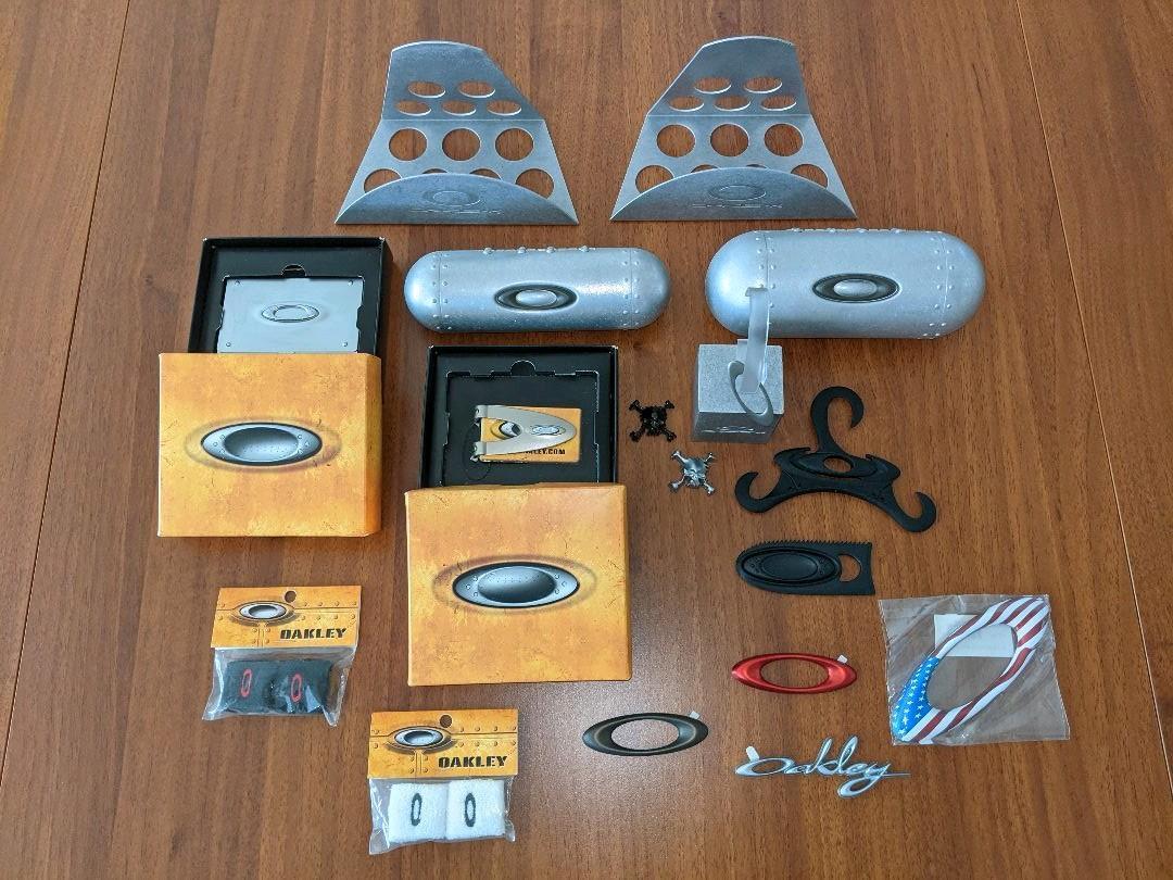Not for sale OAKLEY 18 different Oakley goods stand for display card case