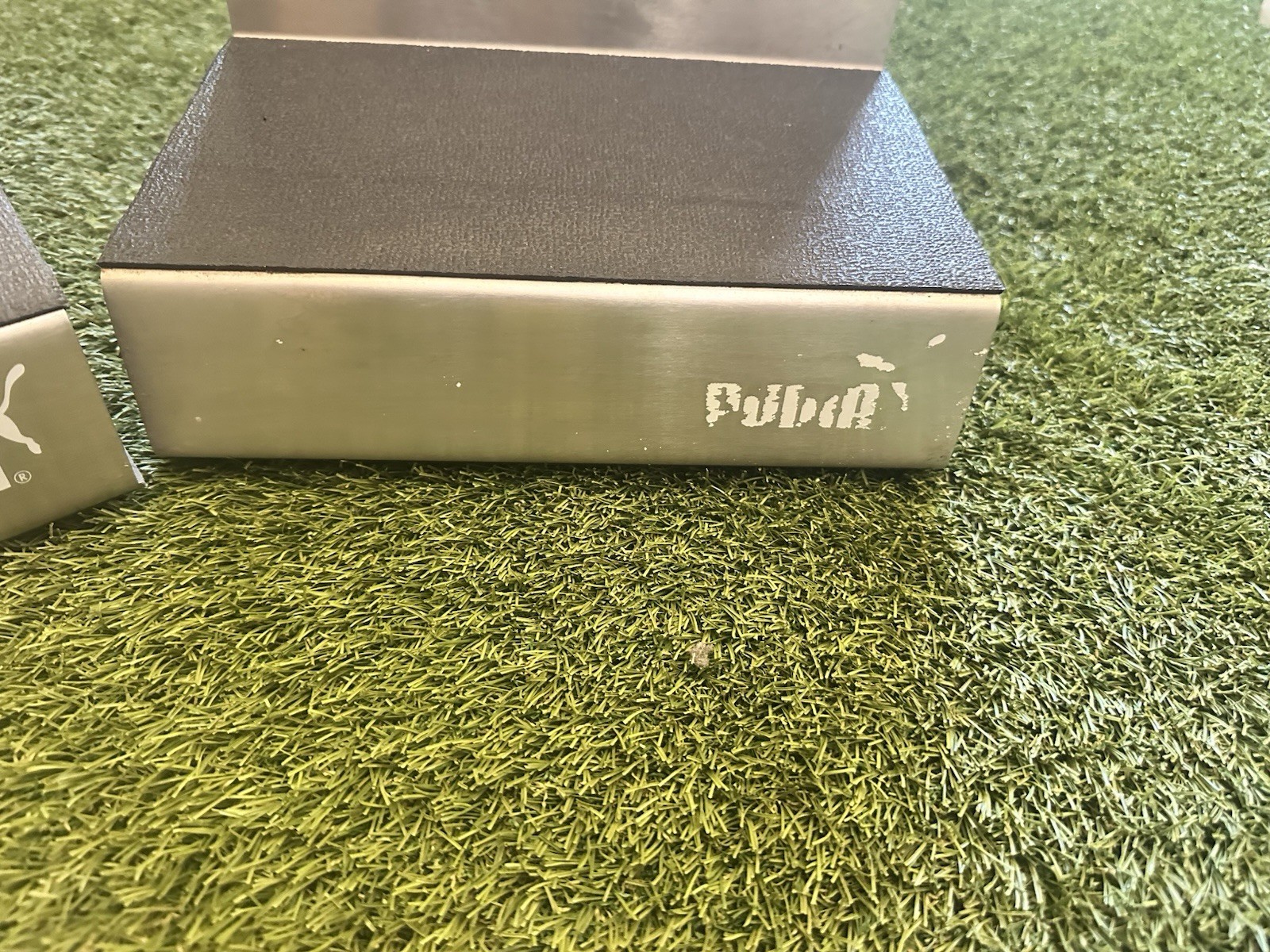 Stainless Steel Puma Shoe Display Advertisement