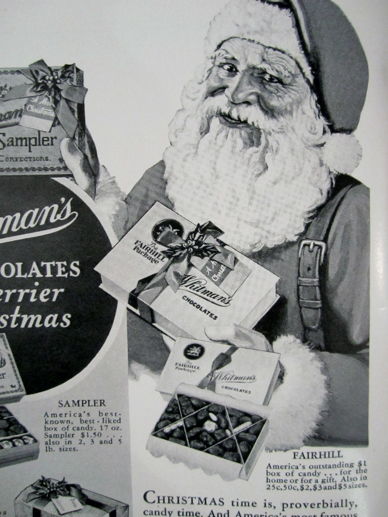 1933 Christmas WHITMAN’S CHOCOLATES SAMPLER STOCKING STUFFERS W SANTA Sign Ad