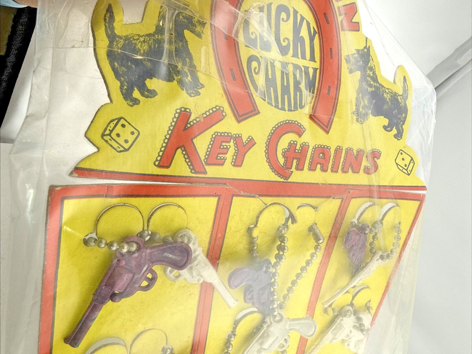 Vtg Lucky Charm Key Chain Plastic White Brown Pistol Guns Original Display of 24