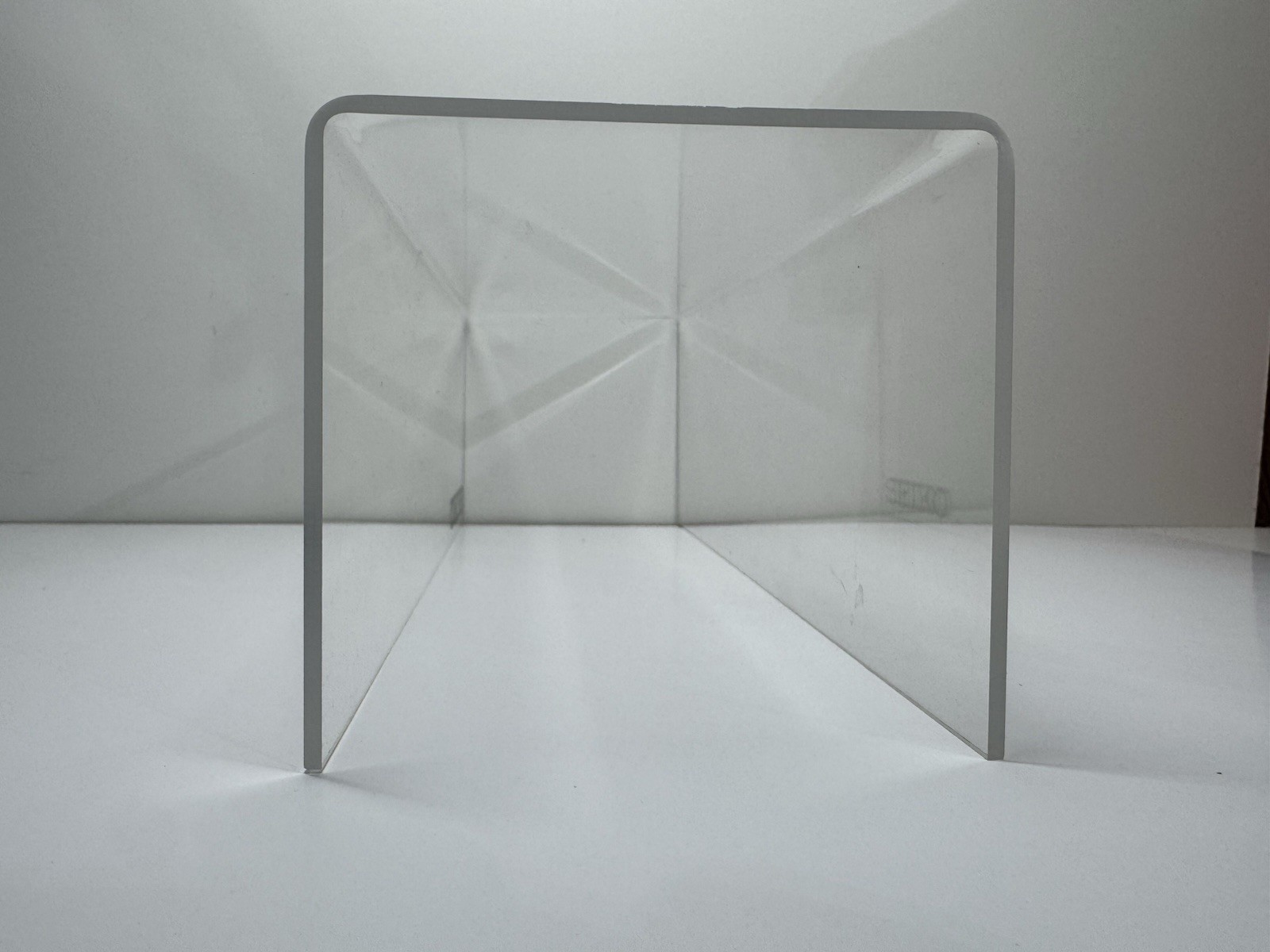2x clear acrylic Seiko branded display holders
