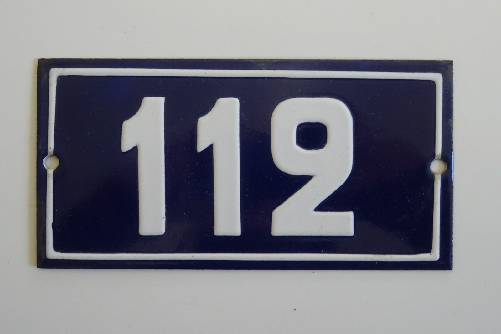 Old street number, house enamelled plaque, embossed No. 112