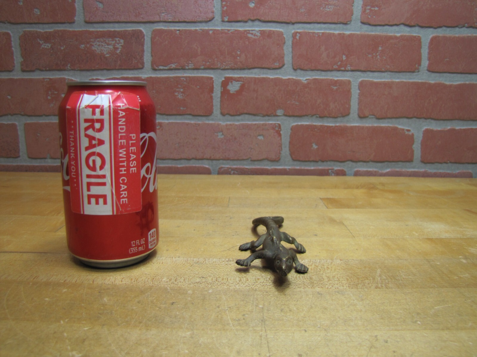 COMPLIMENTS OF C BUCHHOLTZ Co HOBOKEN NJ Antique Advertising Gecko Lizard