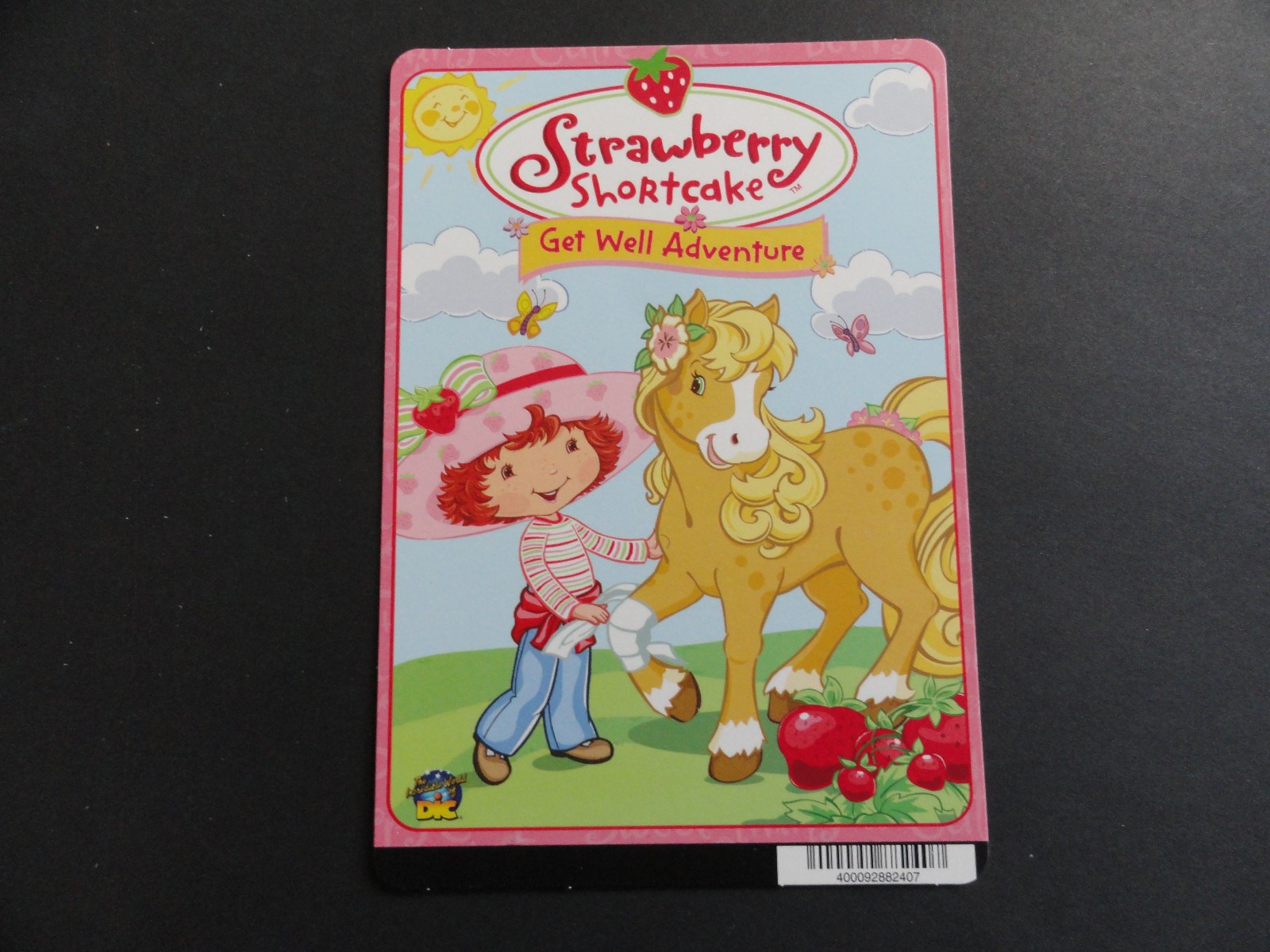 STRAWBERRY SHORTCAKE: GET WELL ADVENTURE BLOCKBUSTER VIDEO STORE BACKER CARD