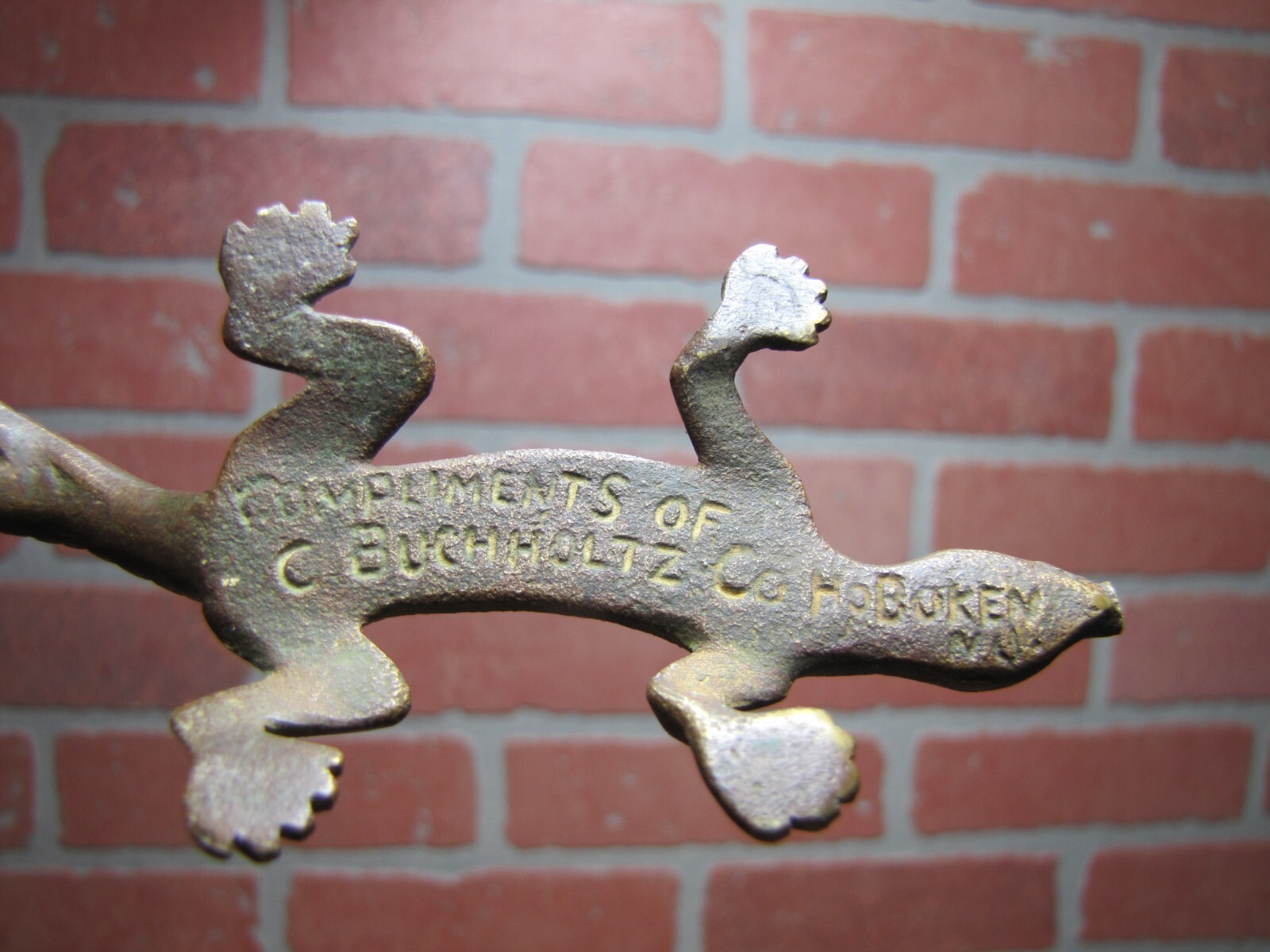 COMPLIMENTS OF C BUCHHOLTZ Co HOBOKEN NJ Antique Advertising Gecko Lizard