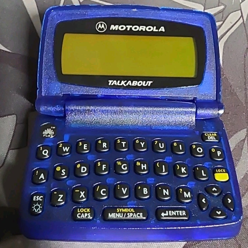 The Motorola Talkabout pager collectible item Missing Battery Cover