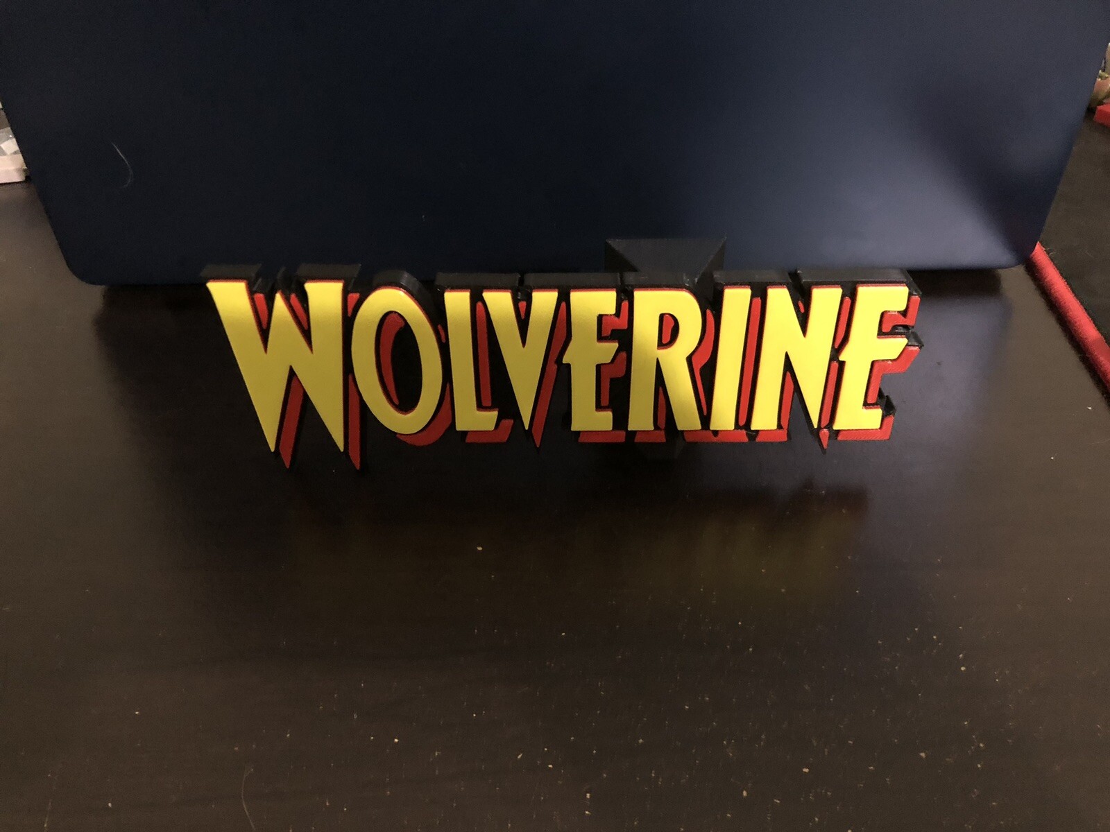 Wolverine Logo/Shelf Display With Magnetic Stand