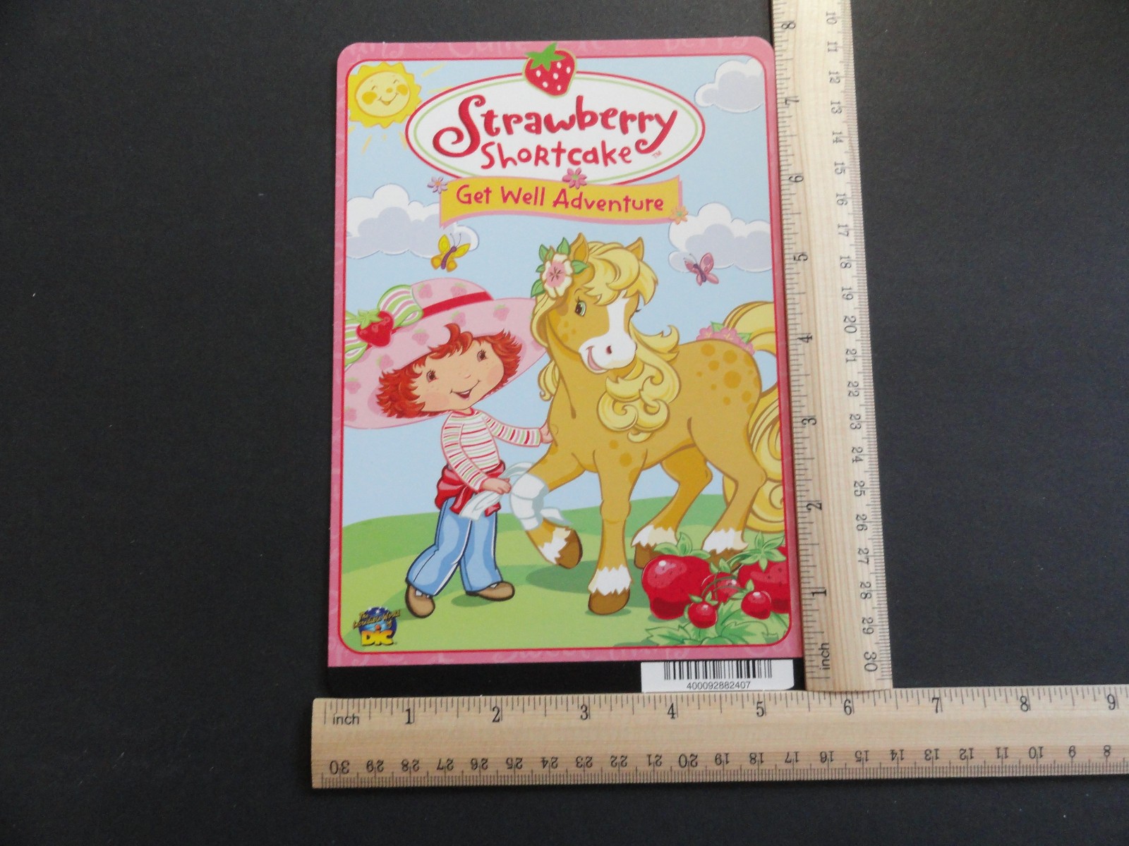 STRAWBERRY SHORTCAKE: GET WELL ADVENTURE BLOCKBUSTER VIDEO STORE BACKER CARD