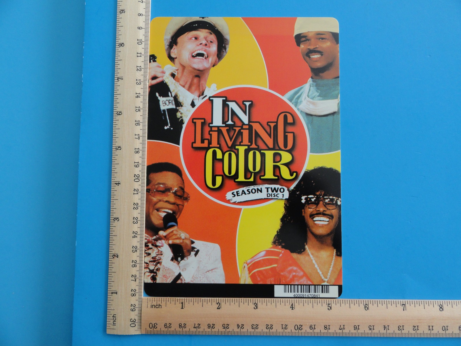 IN LIVING COLOR (S2, #1) BLOCKBUSTER VIDEO BACKER CARD 5″X8″