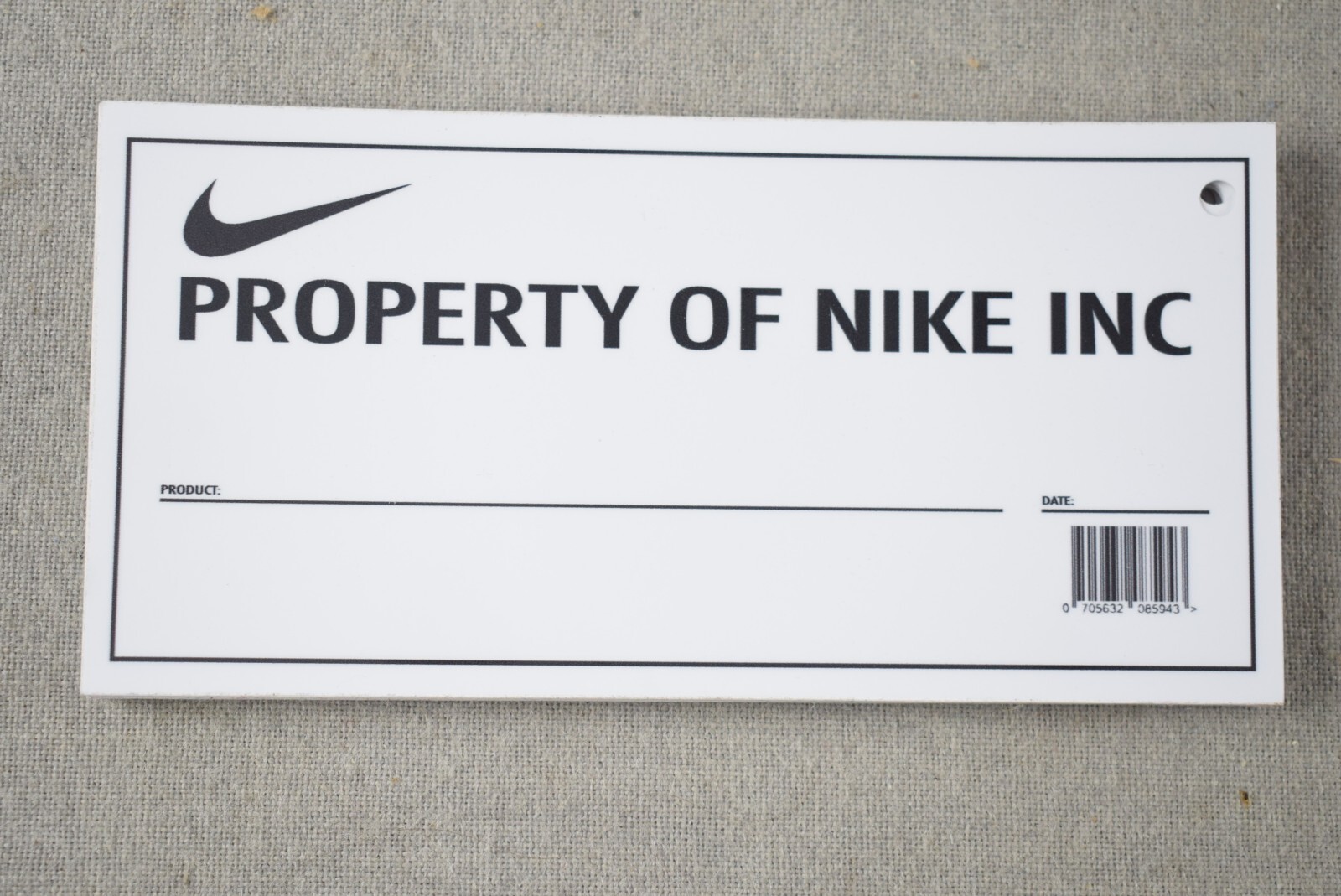 Property of NIKE Inc. Swoosh Plastic Coated Paper Store Display Sign 4″ x 8″