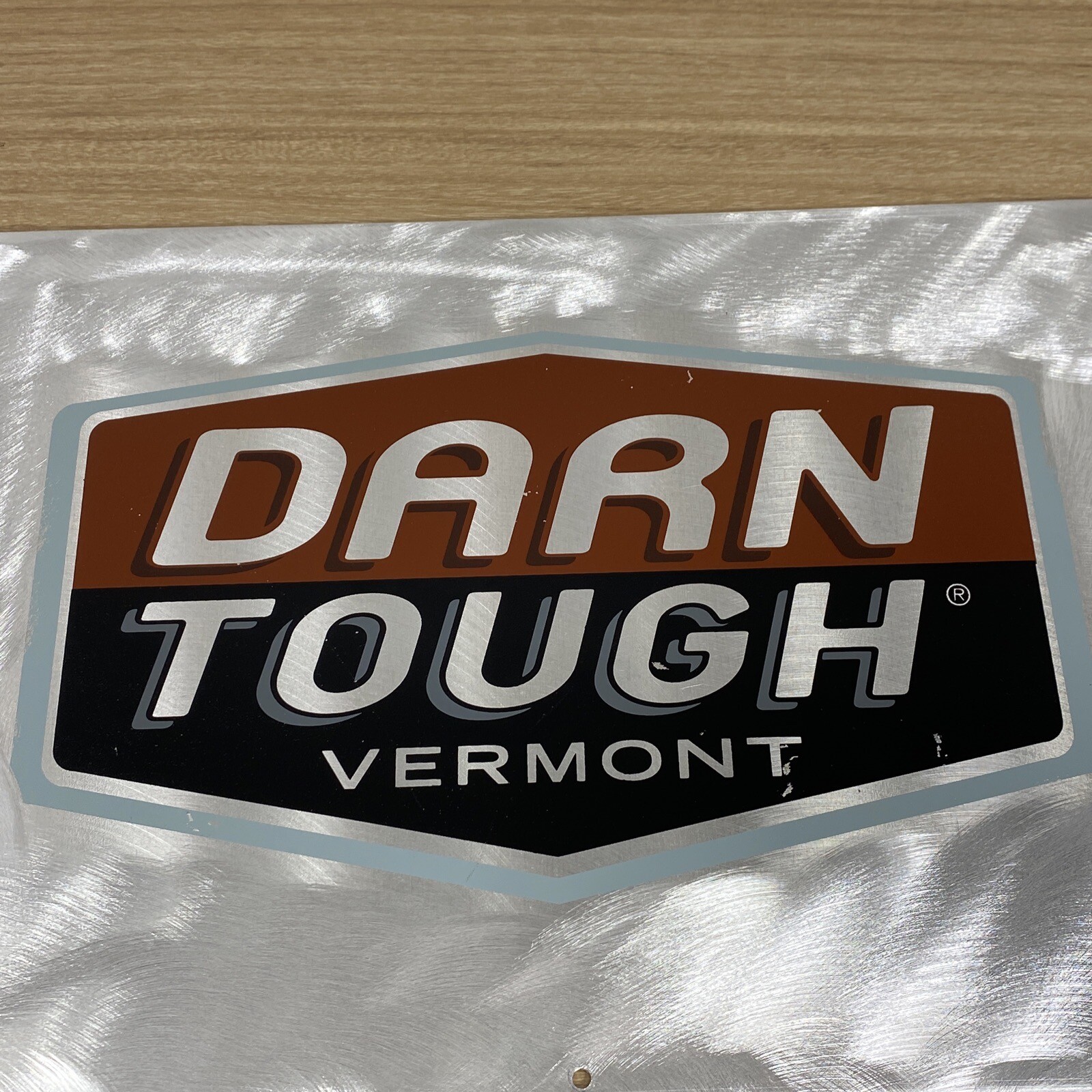 Vintage DARN TOUGH Retired Stainless Steel Advertisement Display Sign 16×10”