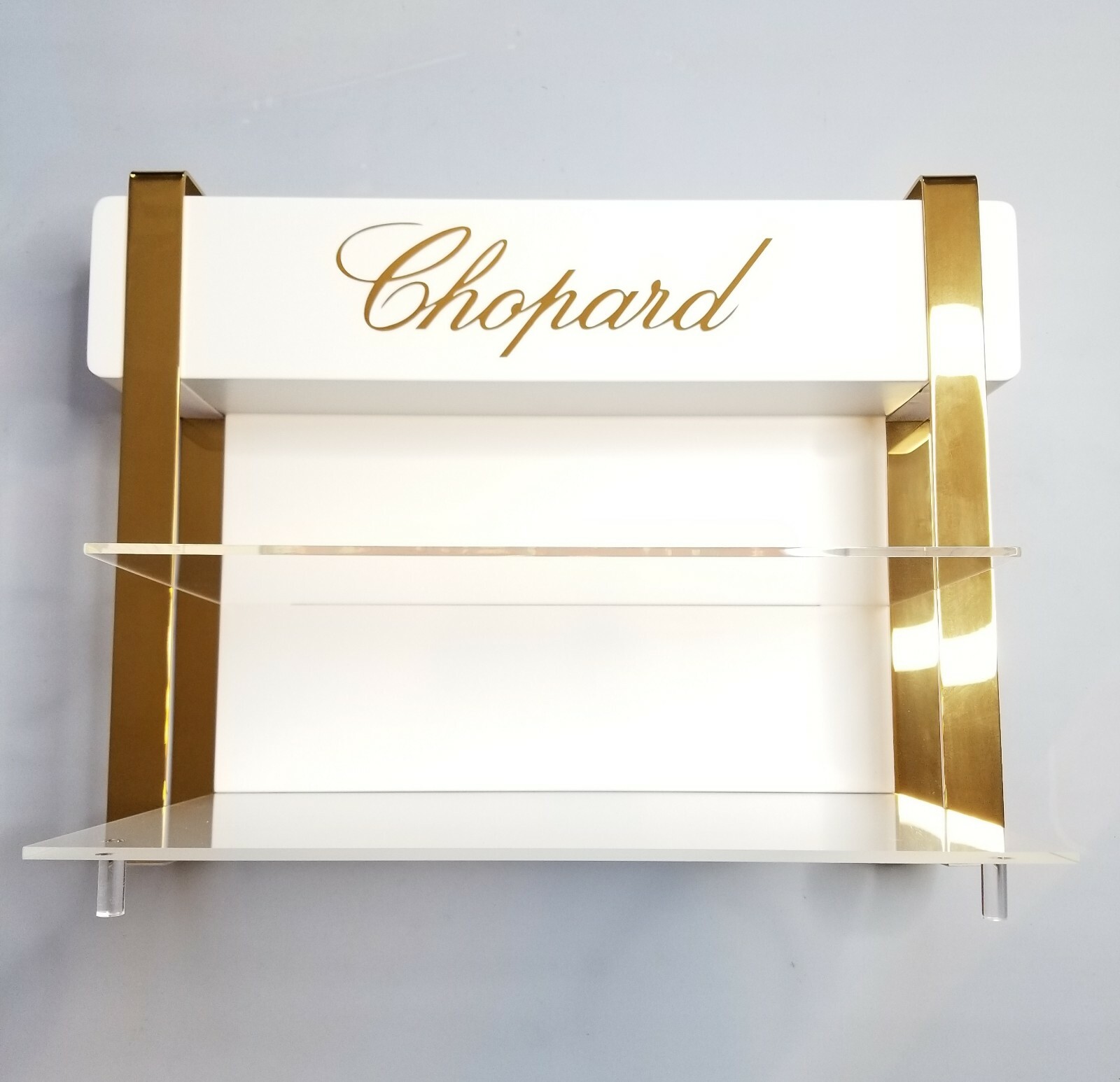CHOPARD FOUR PIECE INSTITUTIONAL DISPLAY UNIT IN IVORY PLEXIGLASS & GOLD METAL