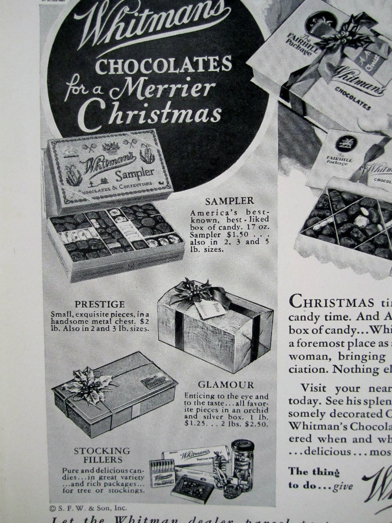 1933 Christmas WHITMAN’S CHOCOLATES SAMPLER STOCKING STUFFERS W SANTA Sign Ad