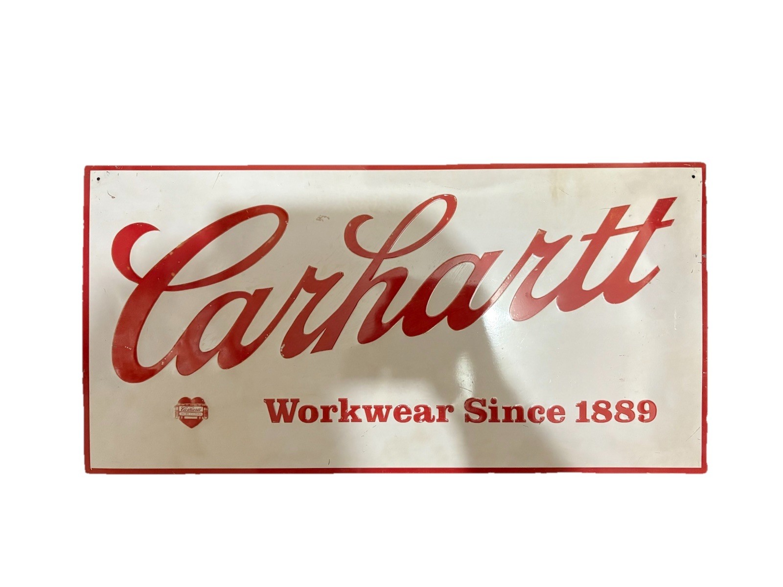 CARHARTT WORKWEAR SINCE 1889 TIN ADVERTISING SIGN EMBOSSED 24″ X 12″