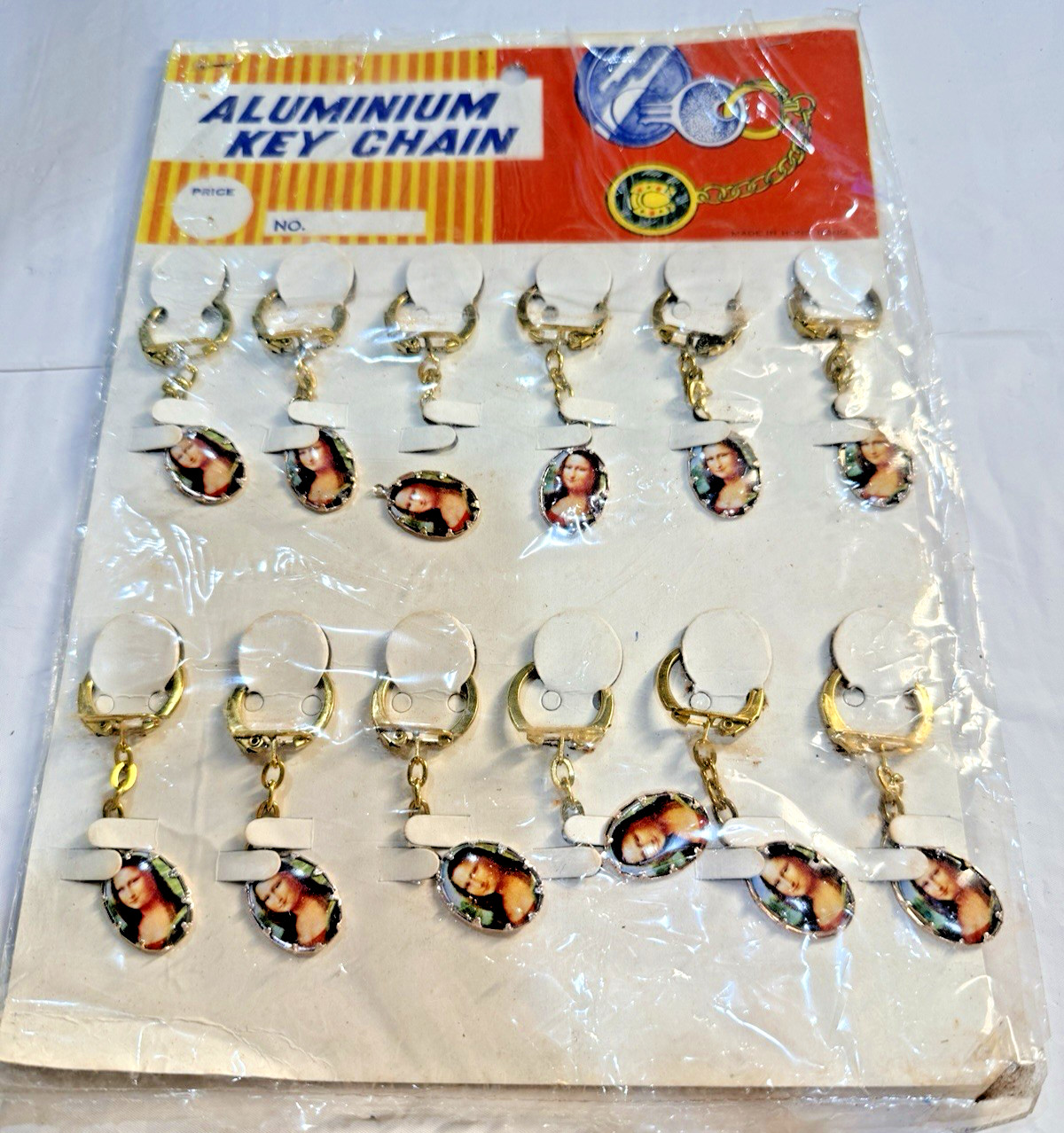 Vtg Novelty Key Chain ALUMINUM Mother Mary Madonna Charm Original Display of 12