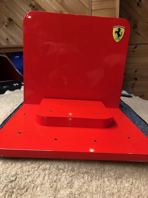 Ferrari Dealer Watch display with Extra Dealer sign and a Lamborghini sign