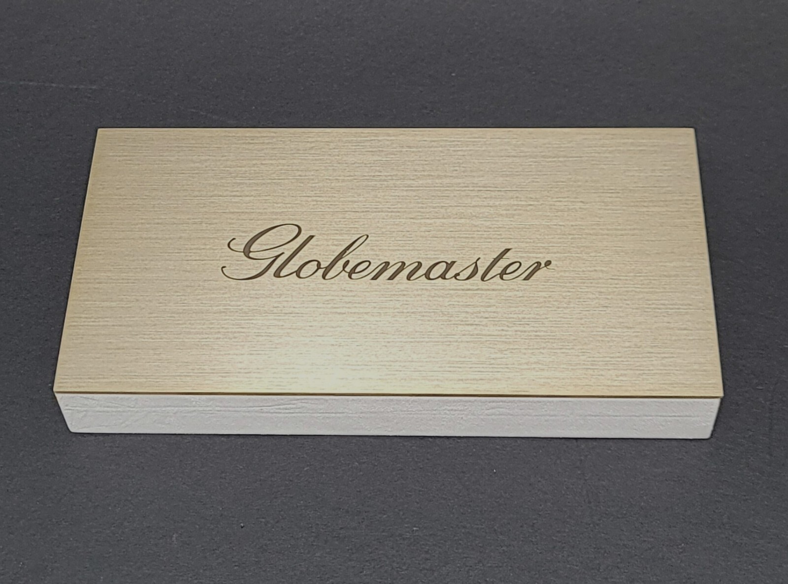 ORIGINAL OMEGA WATCH DEALER’S “GLOBEMASTER” LARGE BRASS AD SIGN