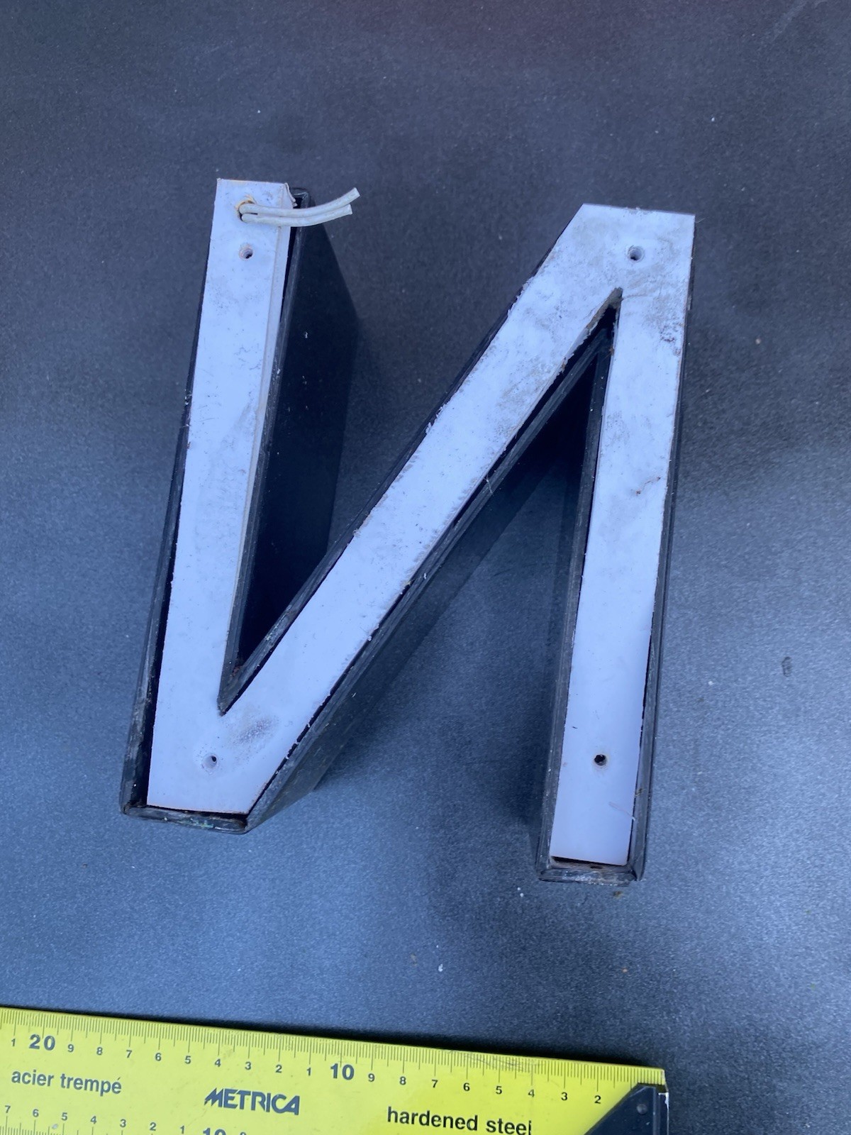 Letter n Ex Sign White Front Black Edge Plex