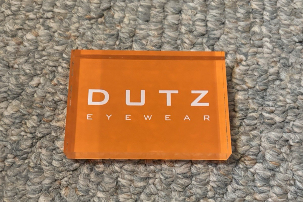 Dutz Eyewear Acrylic Retail Display – Orange Boutique Counter Sign