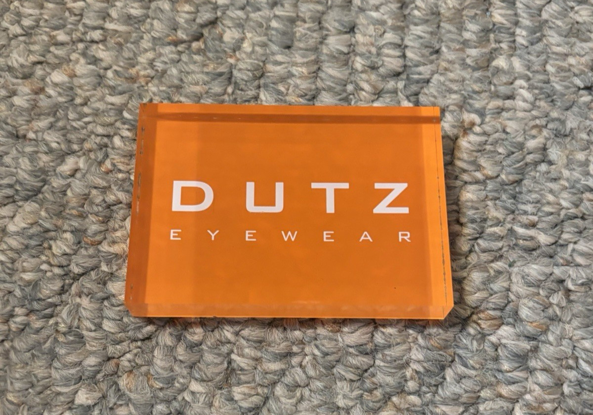 Dutz Eyewear Acrylic Retail Display – Orange Boutique Counter Sign