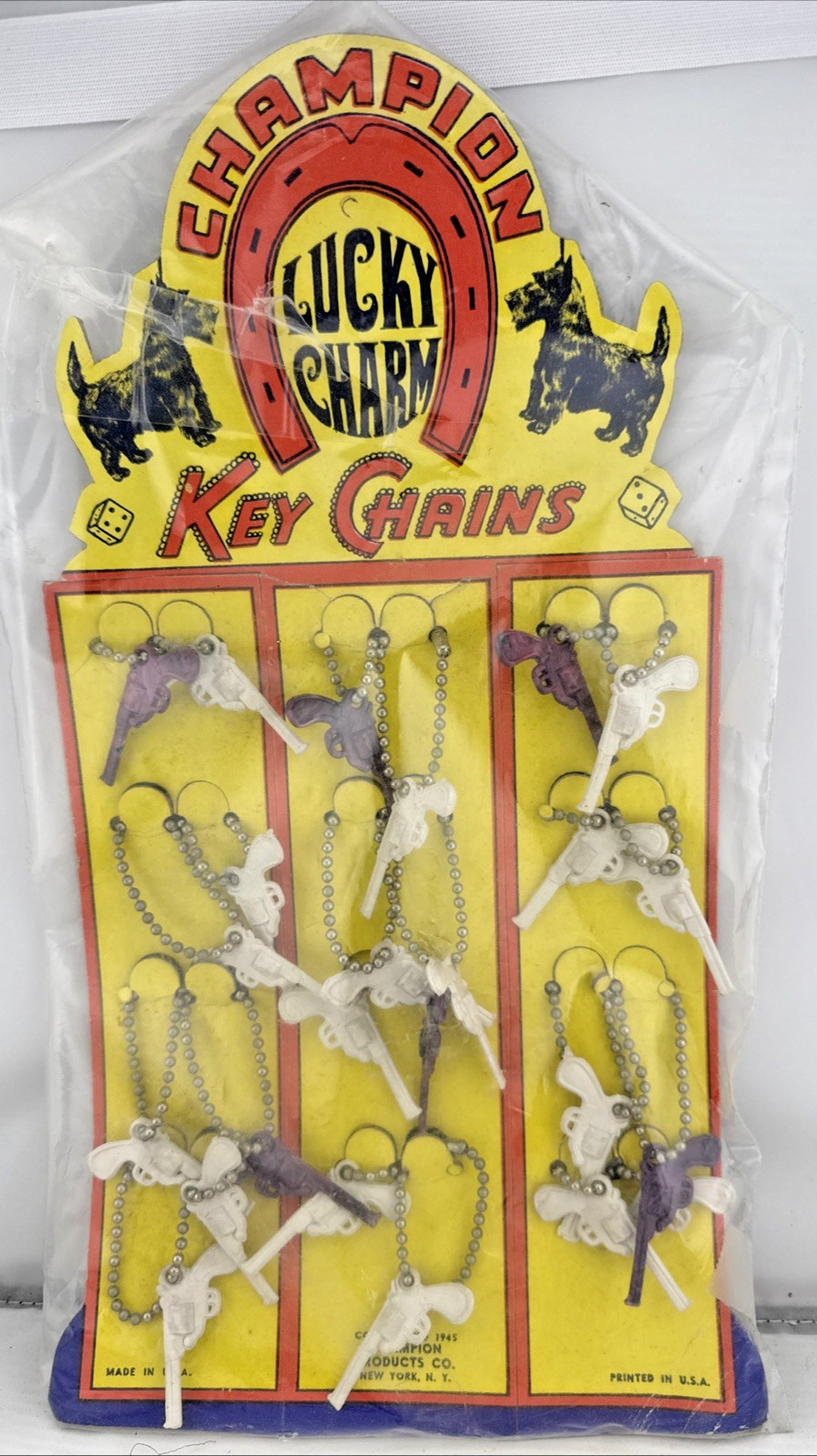 Vtg Lucky Charm Key Chain Plastic White Brown Pistol Guns Original Display of 24