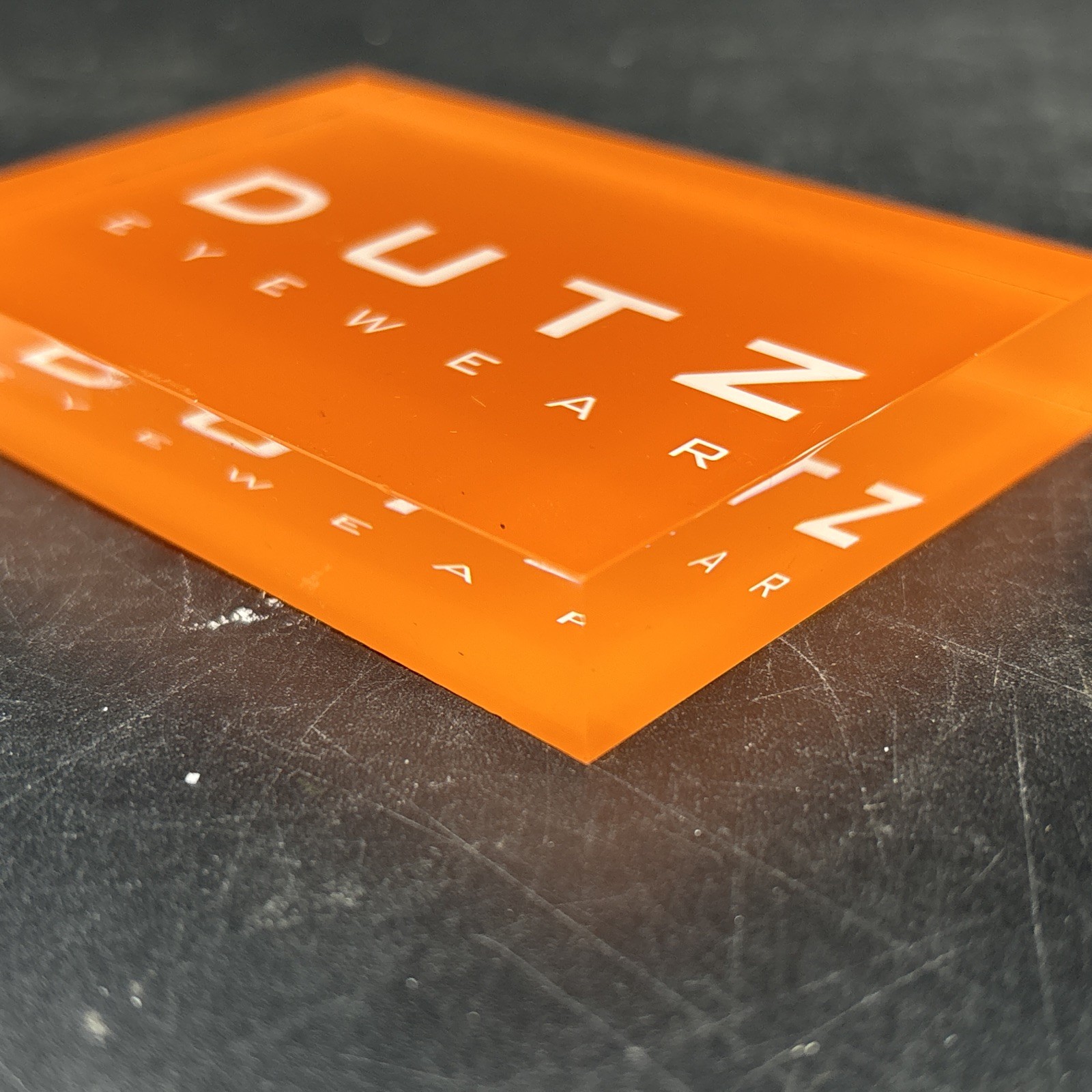 Dutz Eyewear Acrylic Retail Display – Orange Boutique Counter Sign