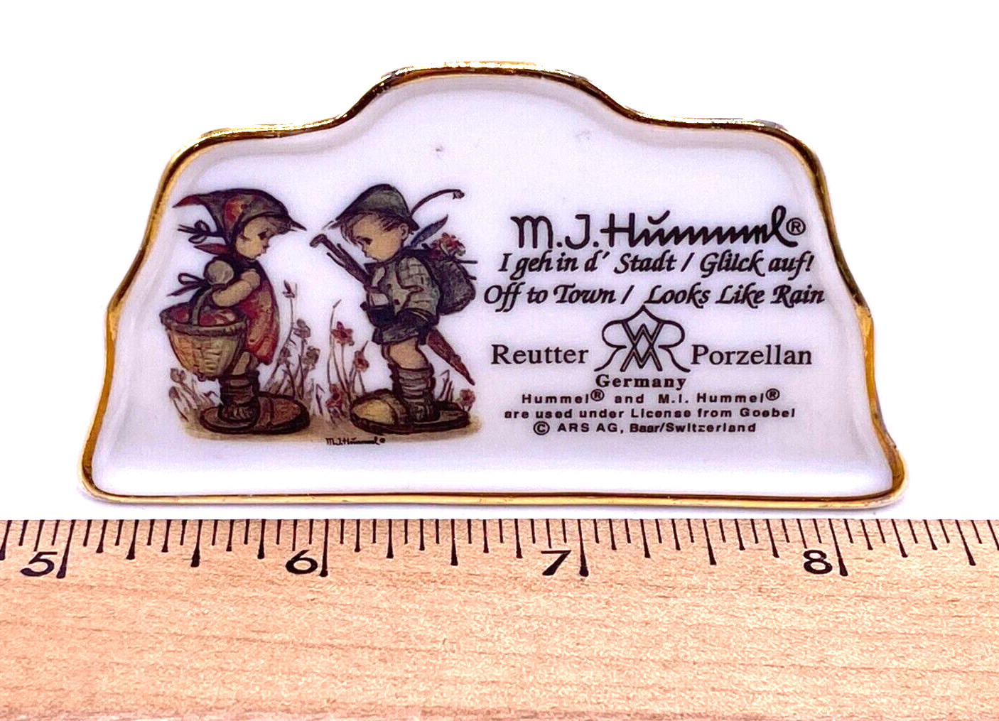 Vintage M.J. Hummel porcelain sign advertising point of sale display