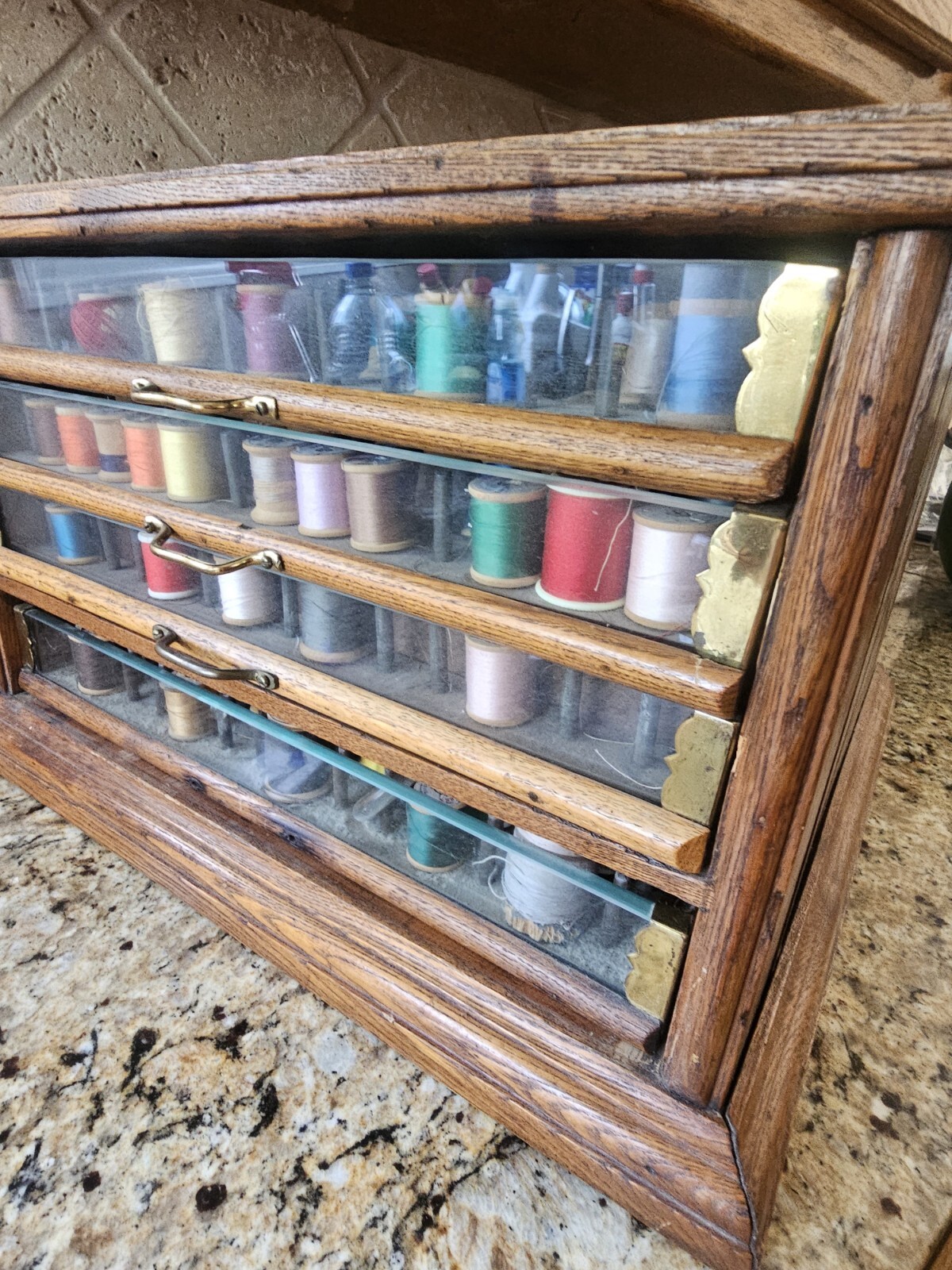 Early A.H. Rice & Co spool cabinet 4 drawer Wood Oak & Glass 19’W x 12″H x 18″D