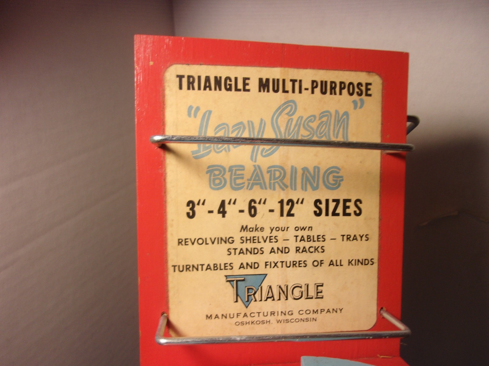 Triangle Co Rotating Bearing Lazy Susan Oshkosh WI Store Counter Display Sign