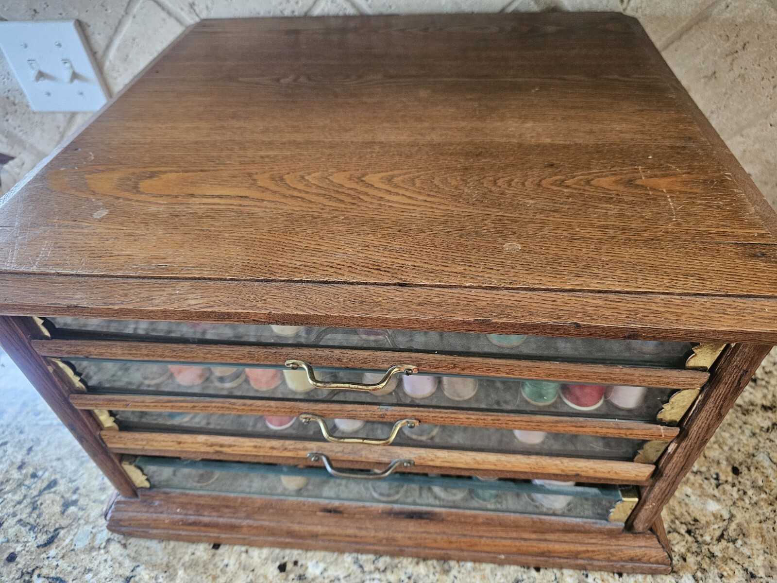 Early A.H. Rice & Co spool cabinet 4 drawer Wood Oak & Glass 19’W x 12″H x 18″D
