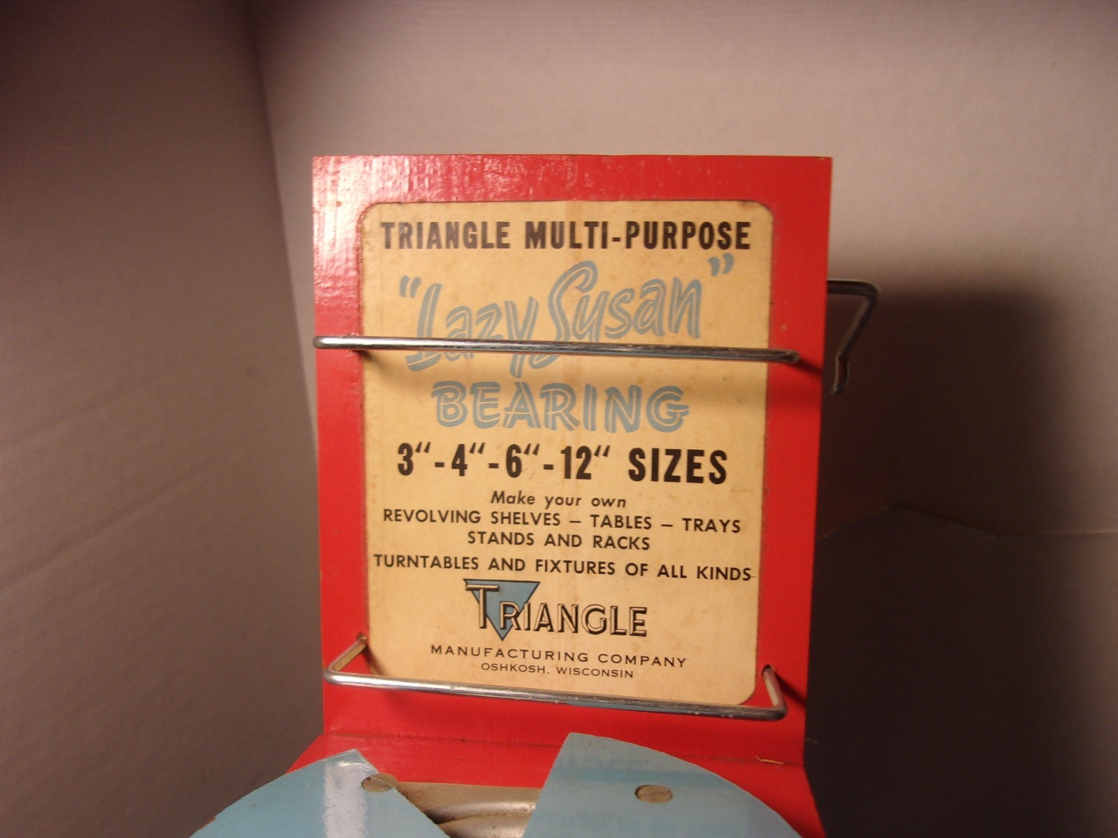 Triangle Co Rotating Bearing Lazy Susan Oshkosh WI Store Counter Display Sign