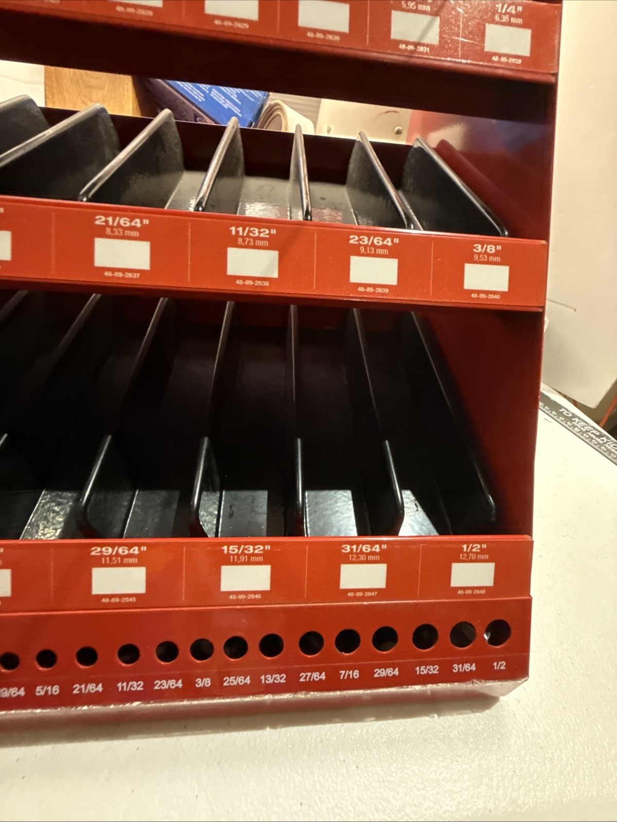 Milwaukee Thunderbolt, Black Oxide Drill Bit Store Display Cabinet Advertisement