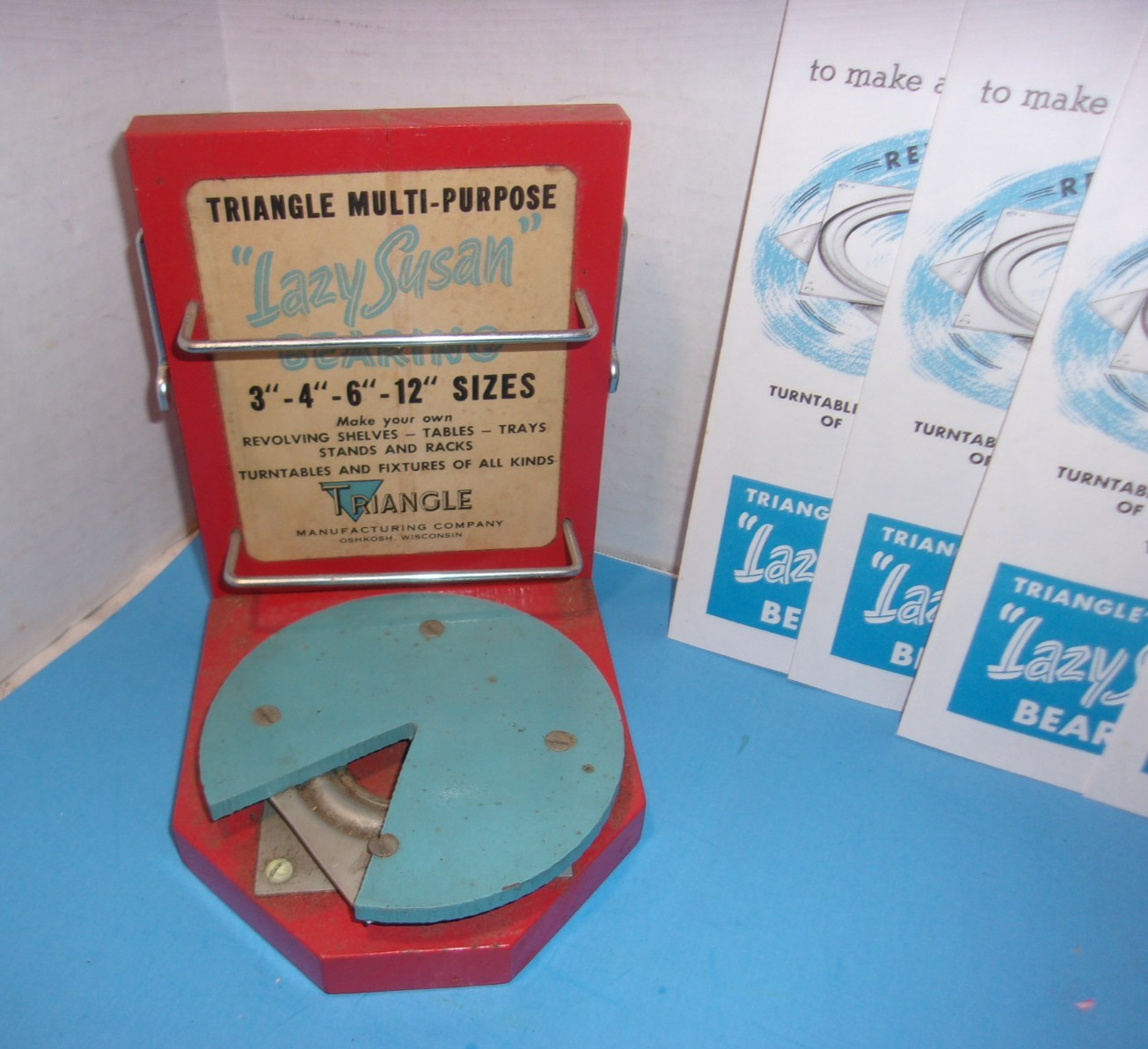 Triangle Co Rotating Bearing Lazy Susan Oshkosh WI Store Counter Display Sign