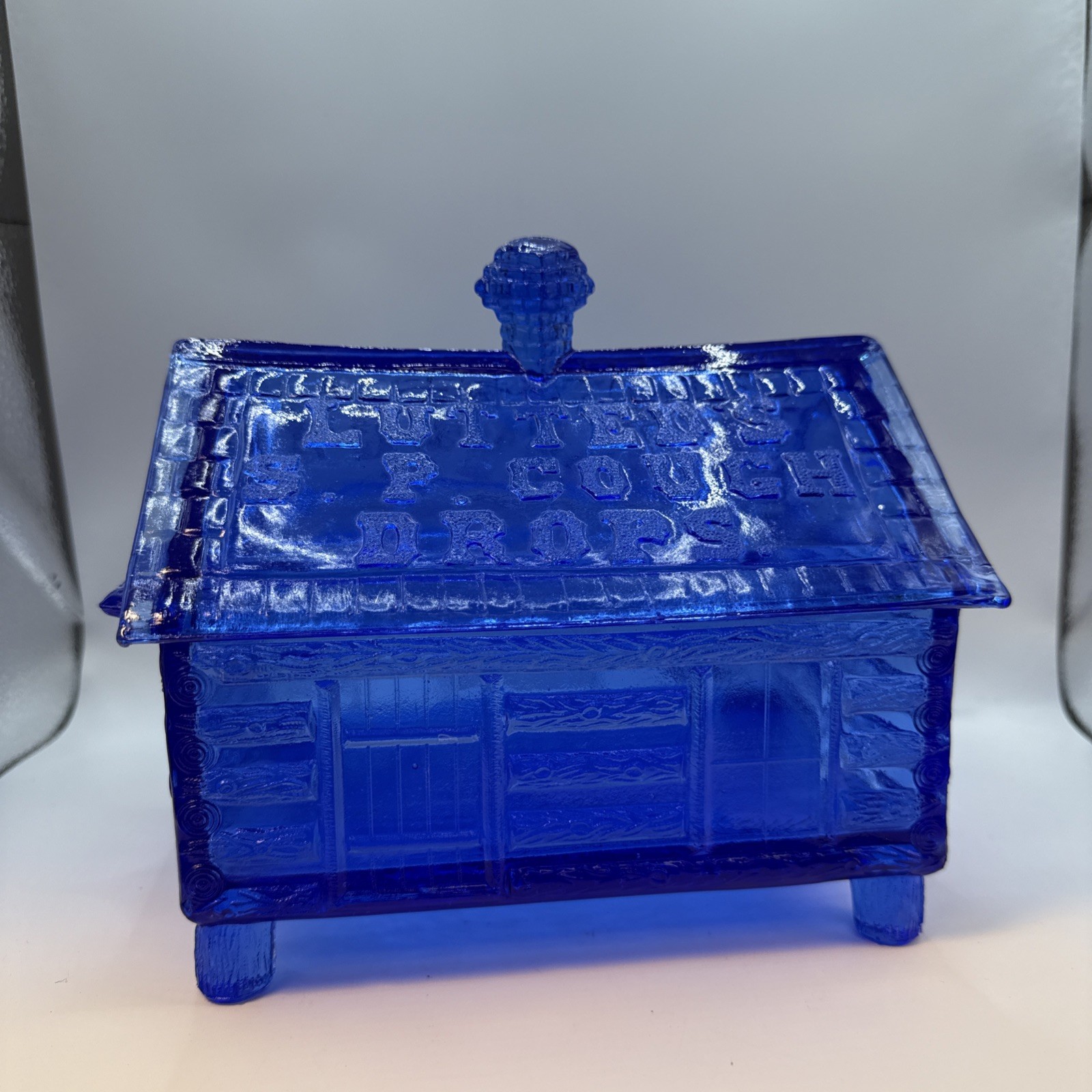 Vintage Lutted’s S.P. Cough Drops Cobalt Blue Glass Log Cabin Candy Dish 7″ H