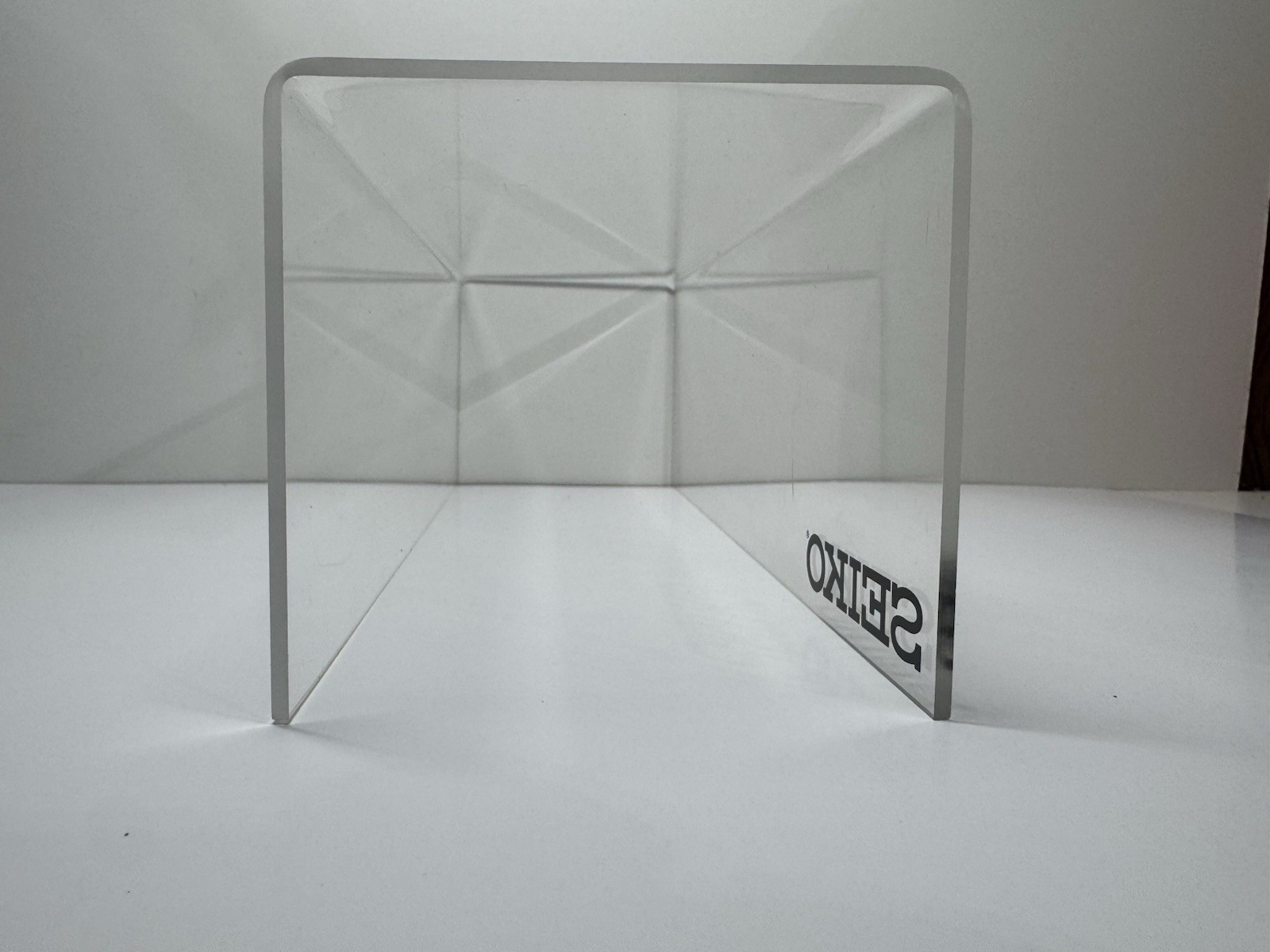 2x clear acrylic Seiko branded display holders