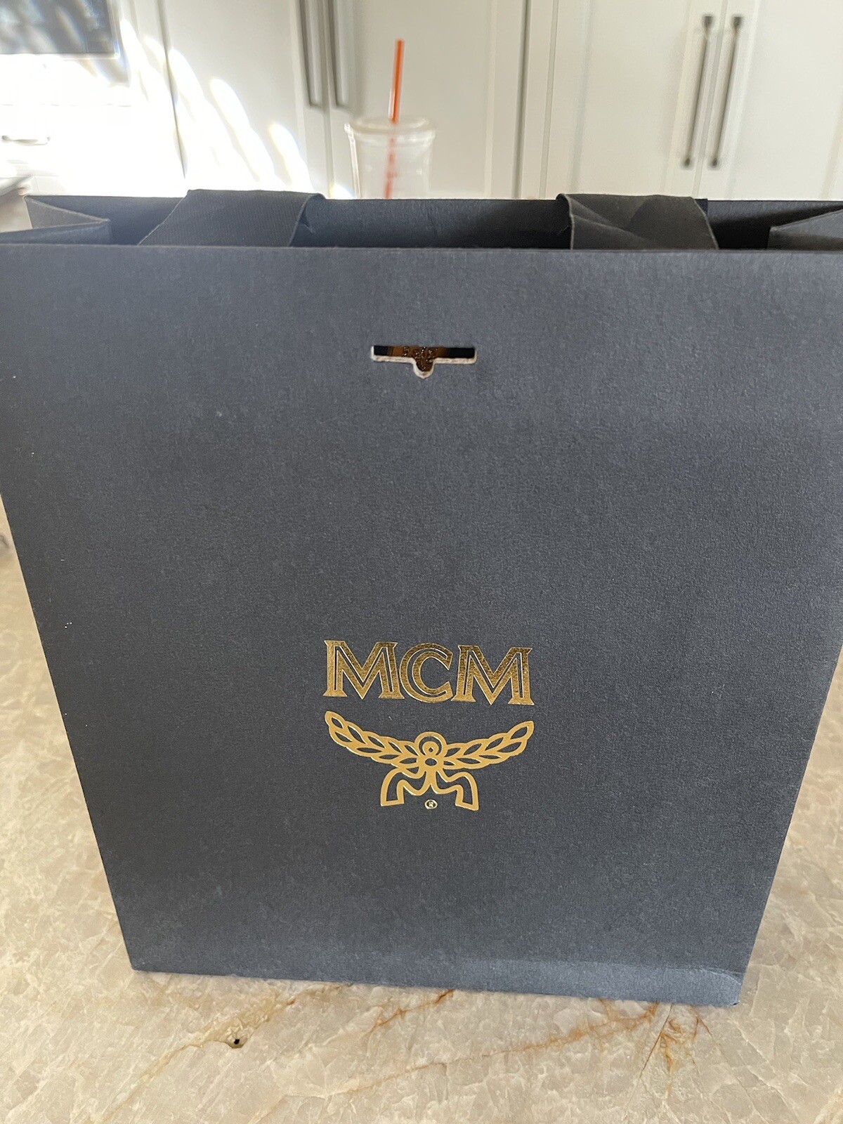 MCM Black with Gold Letters Shopping Bag .Gold Lined . MCM Hardware Closure.RARE