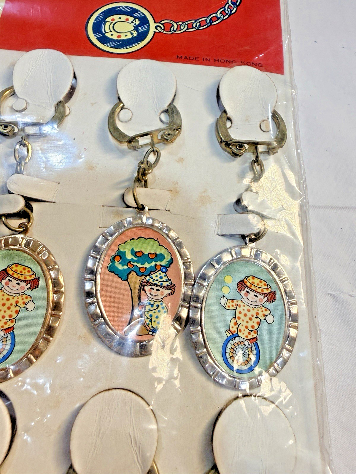 Vtg Novelty Key Chain ALUMINUM Playful Clown Charm Original Display of 12
