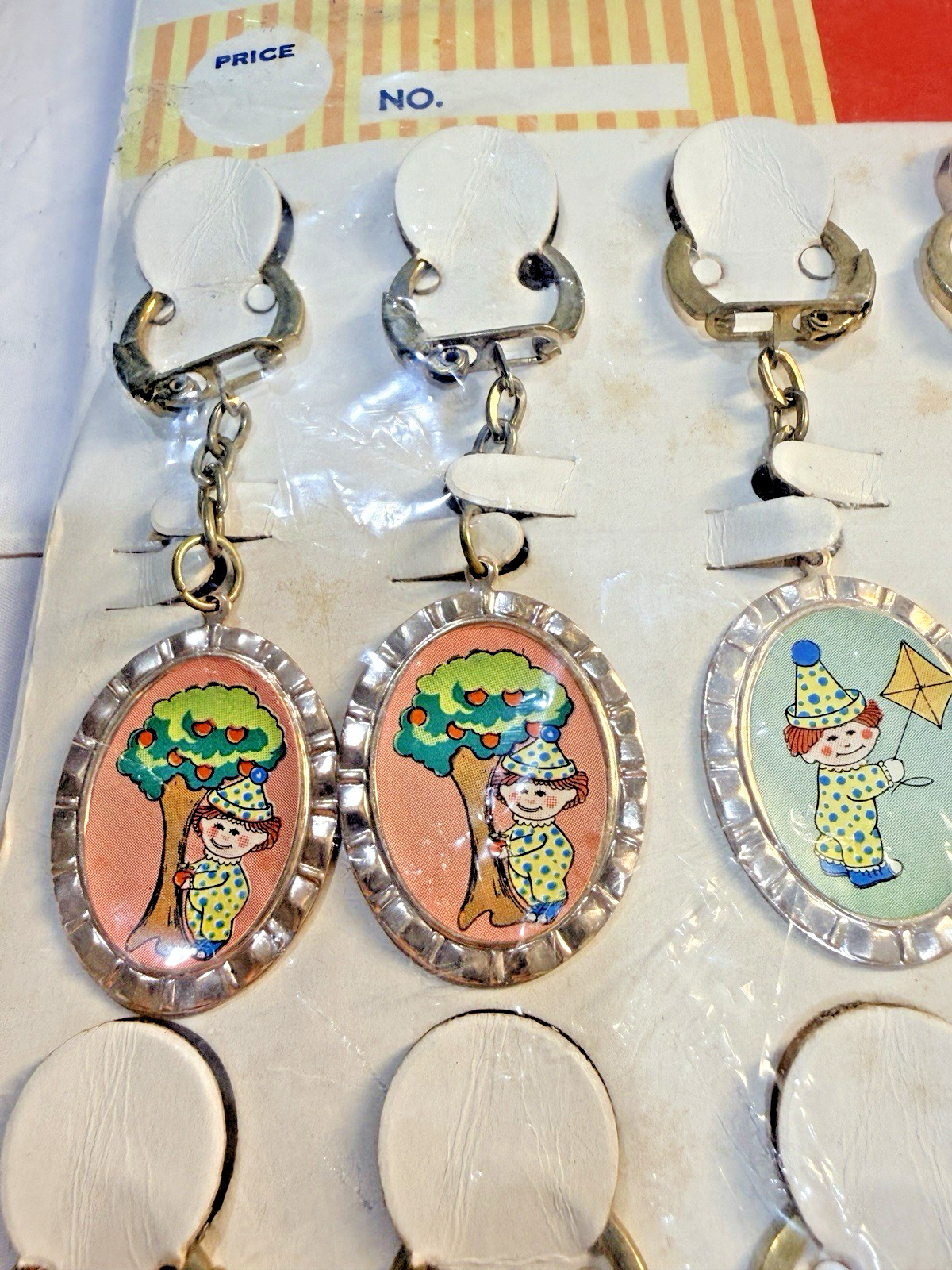 Vtg Novelty Key Chain ALUMINUM Playful Clown Charm Original Display of 12