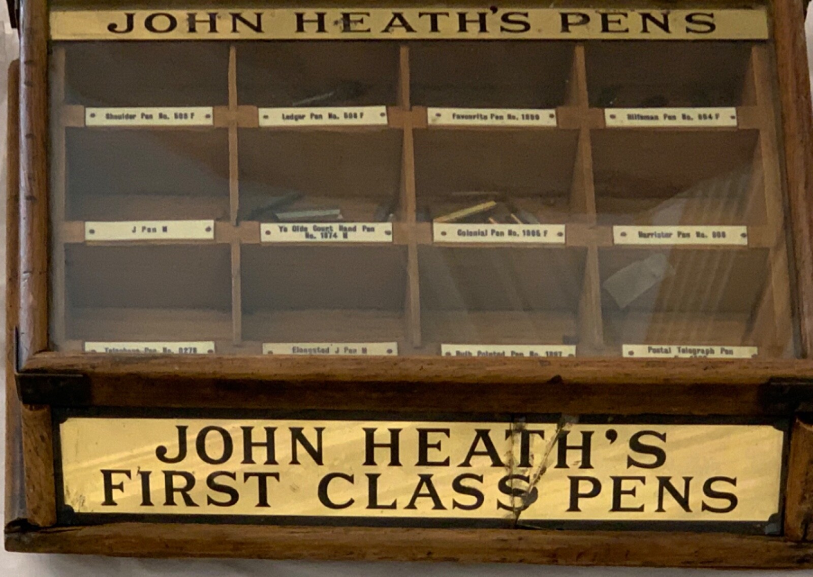 Antique drugstore counter display of John Heath’s First Class Pen Nibs.