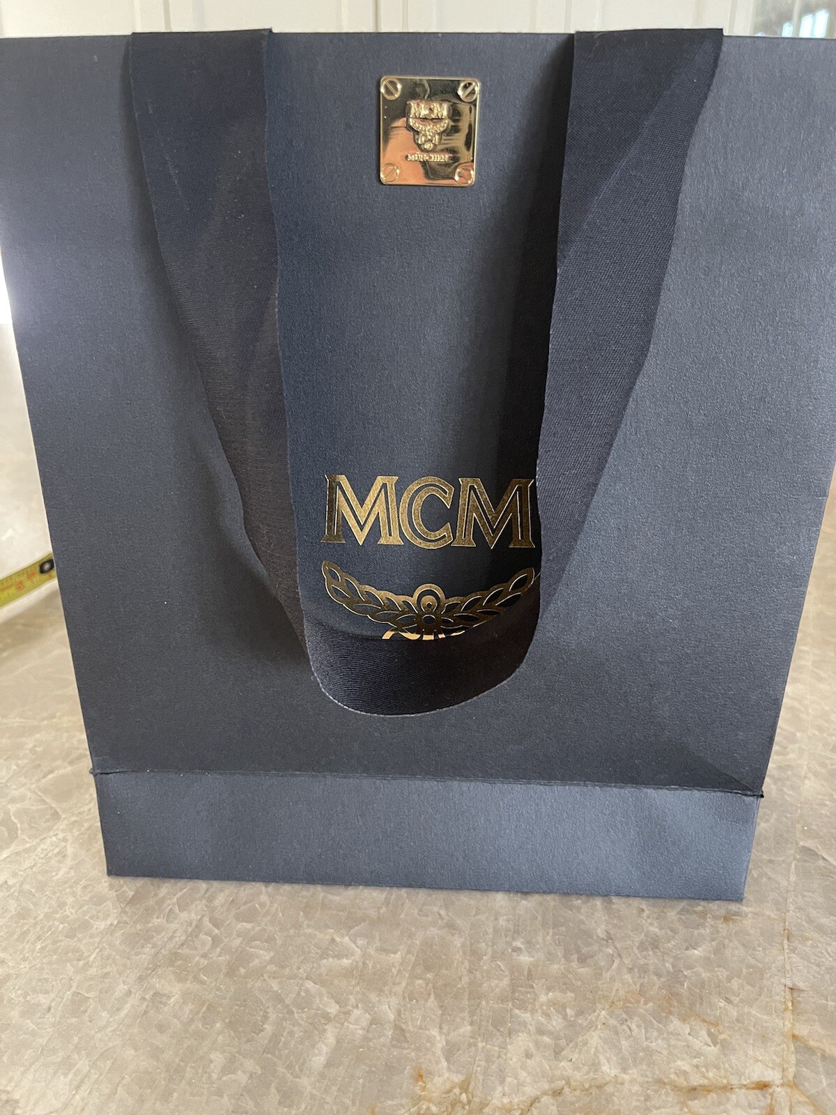 MCM Black with Gold Letters Shopping Bag .Gold Lined . MCM Hardware Closure.RARE