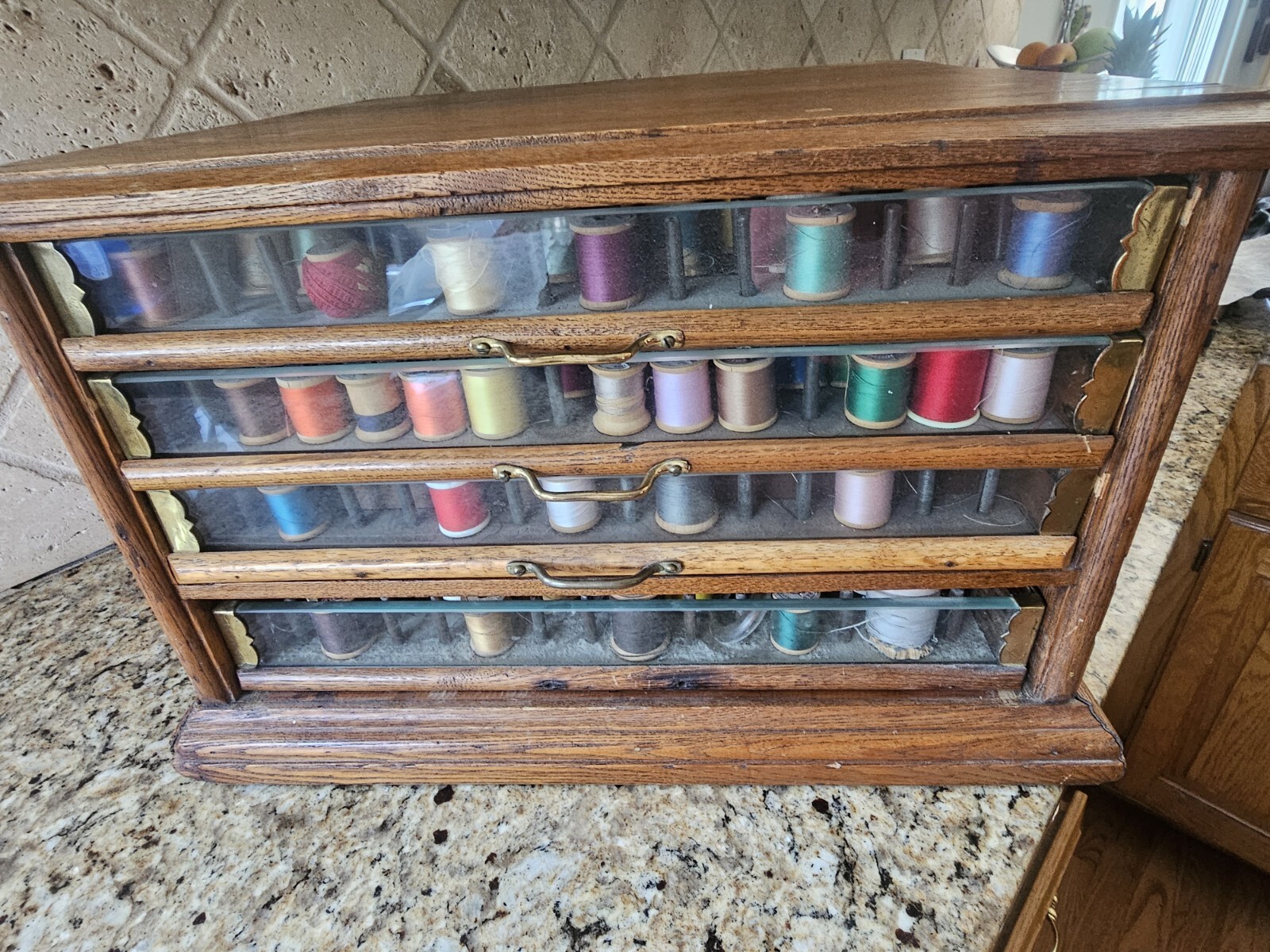 Early A.H. Rice & Co spool cabinet 4 drawer Wood Oak & Glass 19’W x 12″H x 18″D