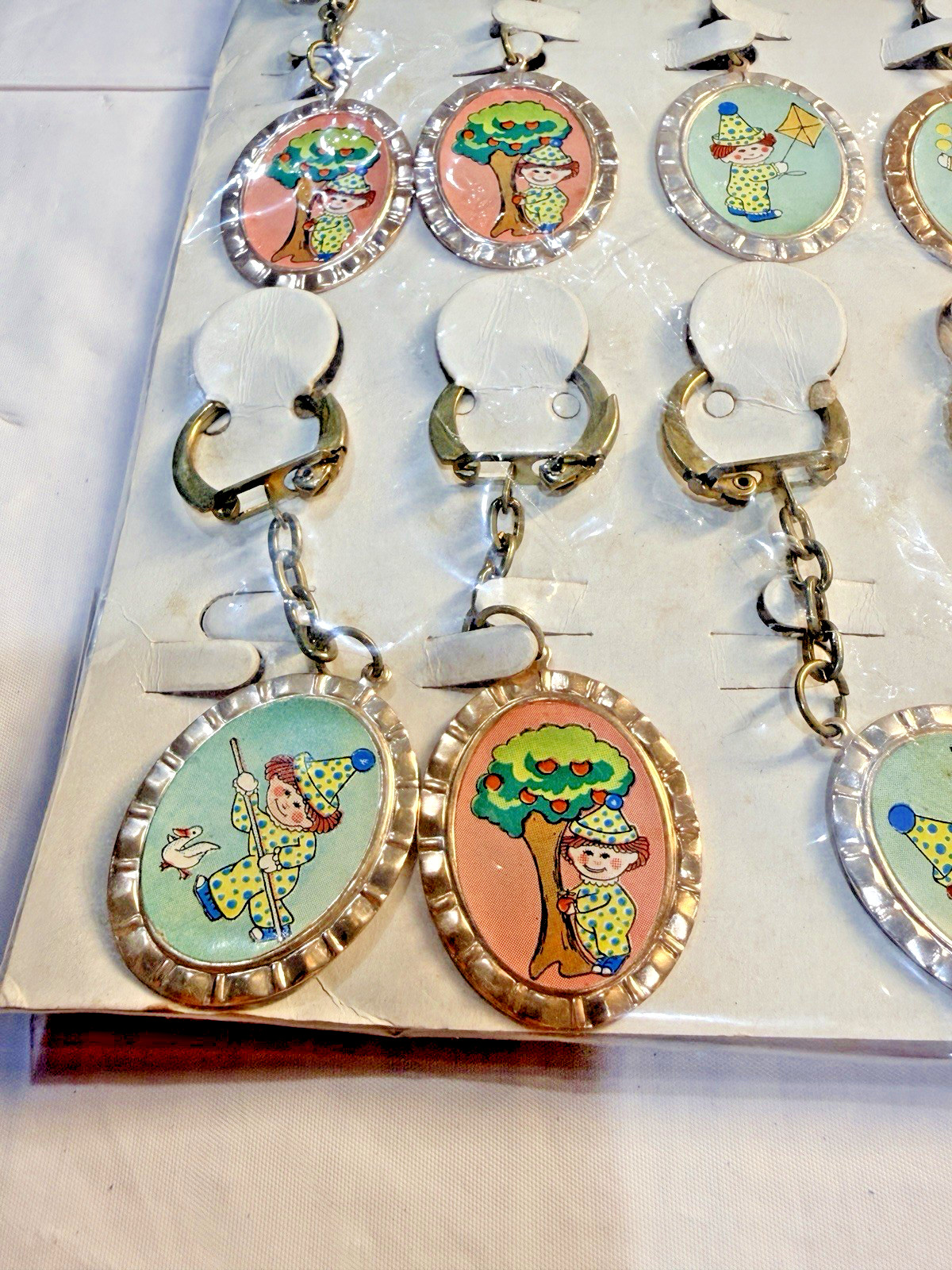 Vtg Novelty Key Chain ALUMINUM Playful Clown Charm Original Display of 12