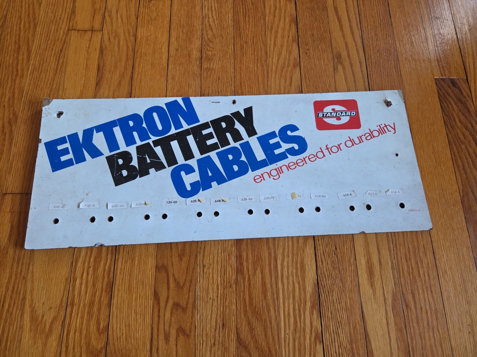 VTG Ektron Battery Cables Standard Advertising Masonite Store Display Sign 9×23″