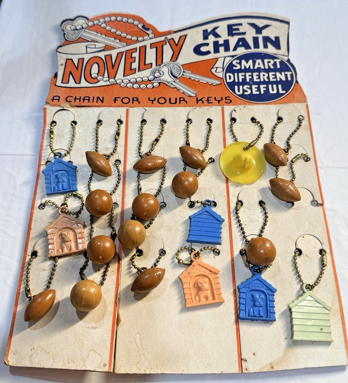 Vtg Novelty Key Chain Plastic Sports Dog House Cowboy Hat Original Display of 24