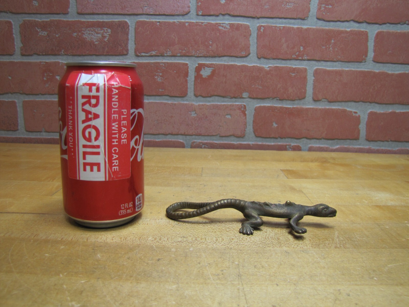 COMPLIMENTS OF C BUCHHOLTZ Co HOBOKEN NJ Antique Advertising Gecko Lizard