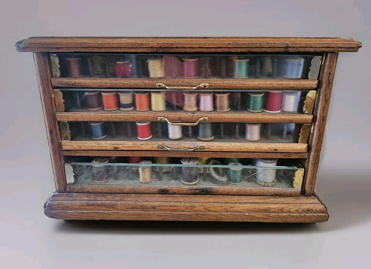 Early A.H. Rice & Co spool cabinet 4 drawer Wood Oak & Glass 19’W x 12″H x 18″D