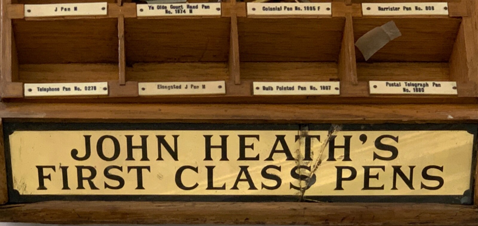 Antique drugstore counter display of John Heath’s First Class Pen Nibs.