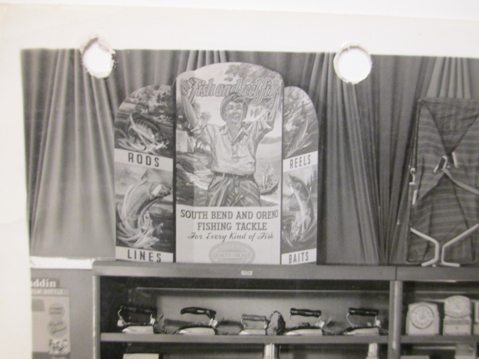 Aurora 1930s South Bend fishing car part store display photo Texas motor oil can